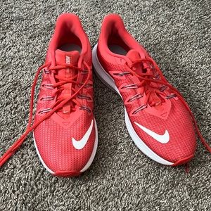 Nike womens running shoes, size 9, red/pink color. Great condition.